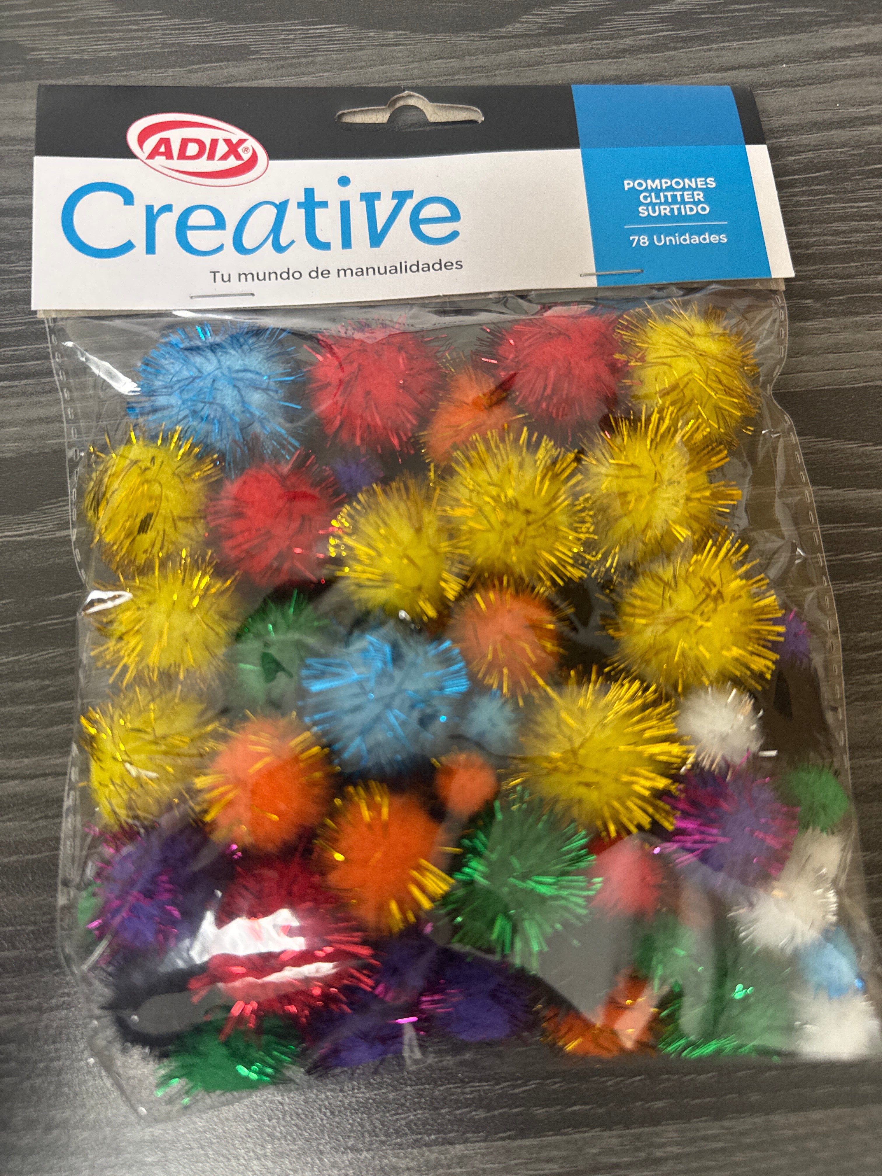 Pompom con glitter pk/78unidades